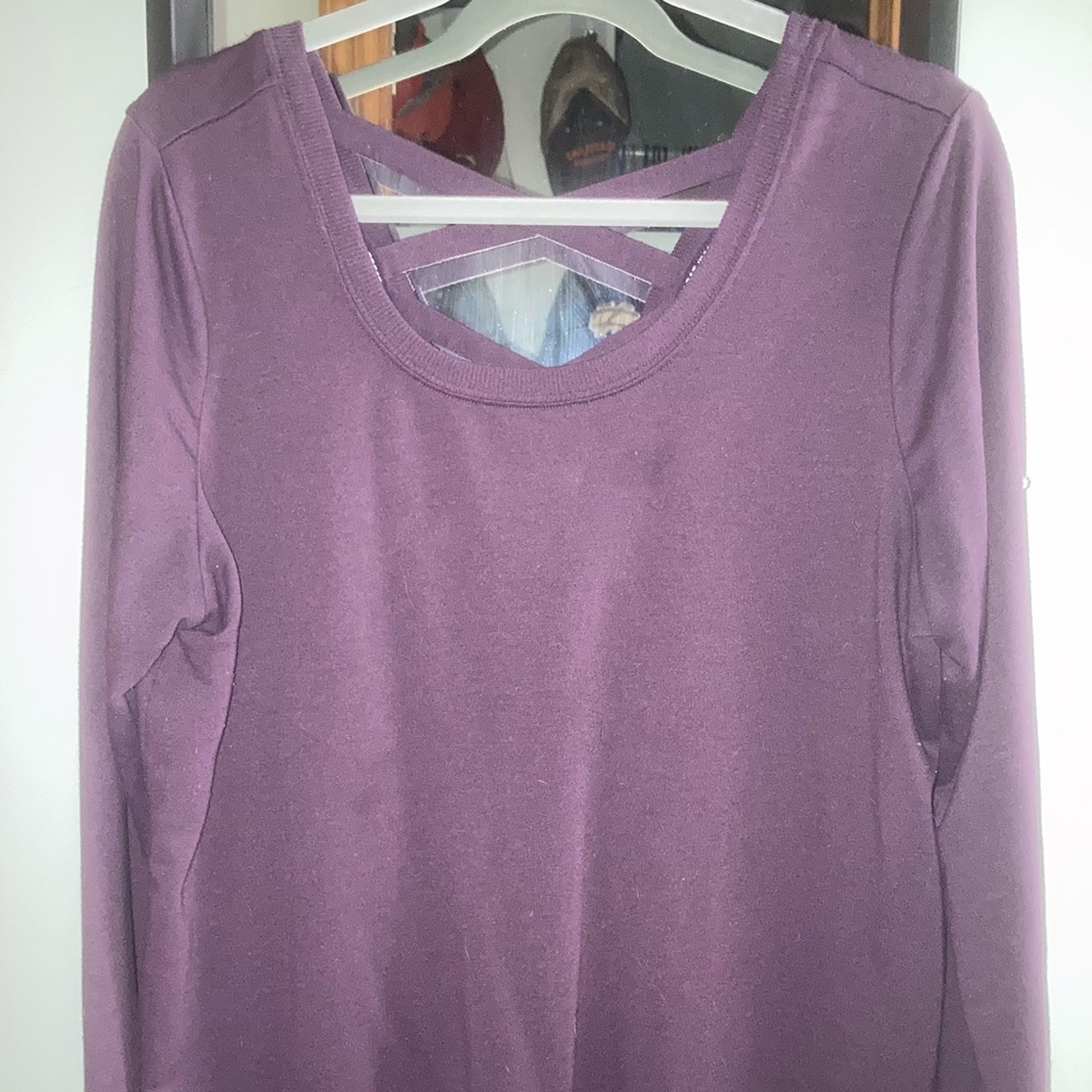 Dark purple pull over sweatshirt.